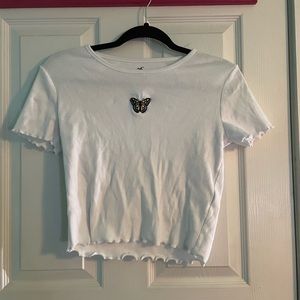 Womens (M) Hollister baby tee with ruffle trim and butterfly detail